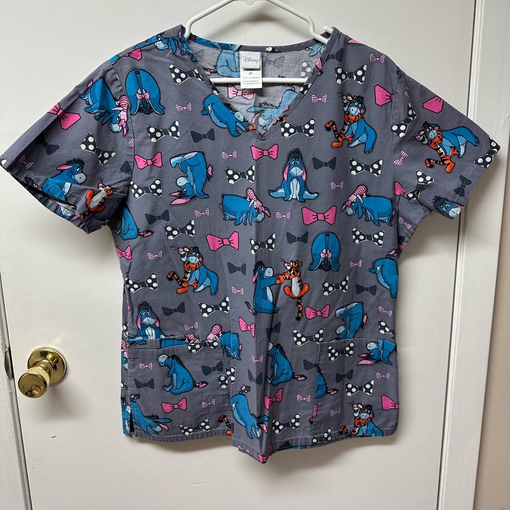 Women’s scrub top, excellent condition.